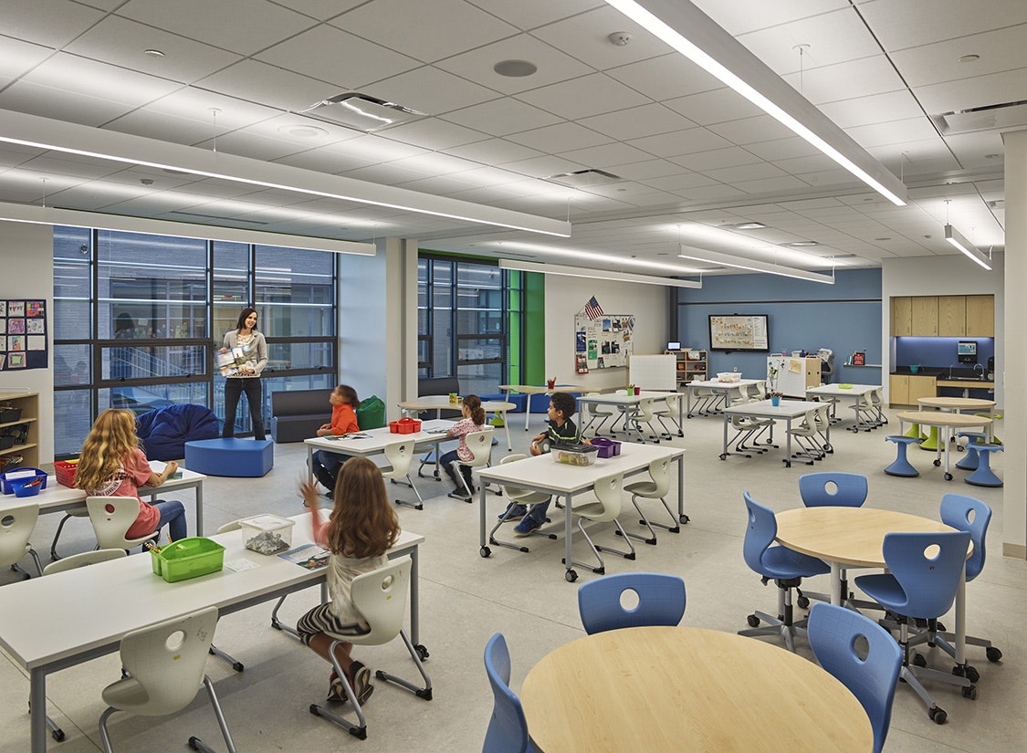 The elementary school features 3 floors, including 42 classrooms subdivided into innovative “learning neighborhoods” which will encourage collaboration and novel curricular arrangements that support teaching and learning, while allowing for flexibility in how the building is used.